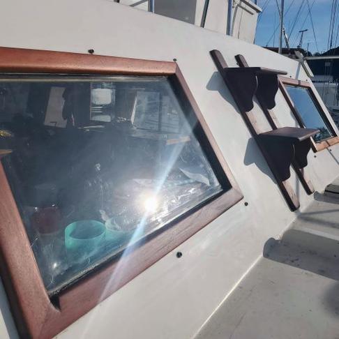 Trawler. stripped, sanded with 3 coats of Watco teak oil
